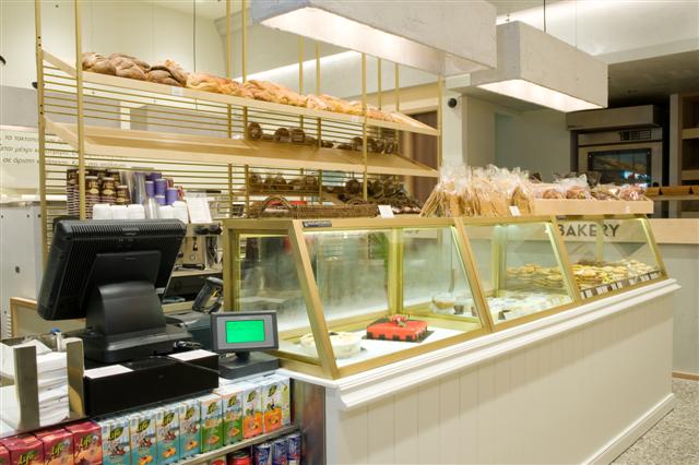 Bronze pastry display and bakery shelves